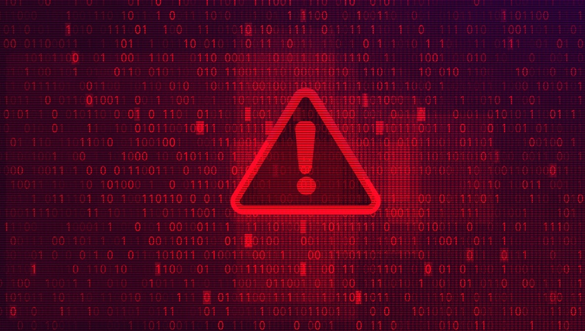 computer code image with a warning triangle overlaid