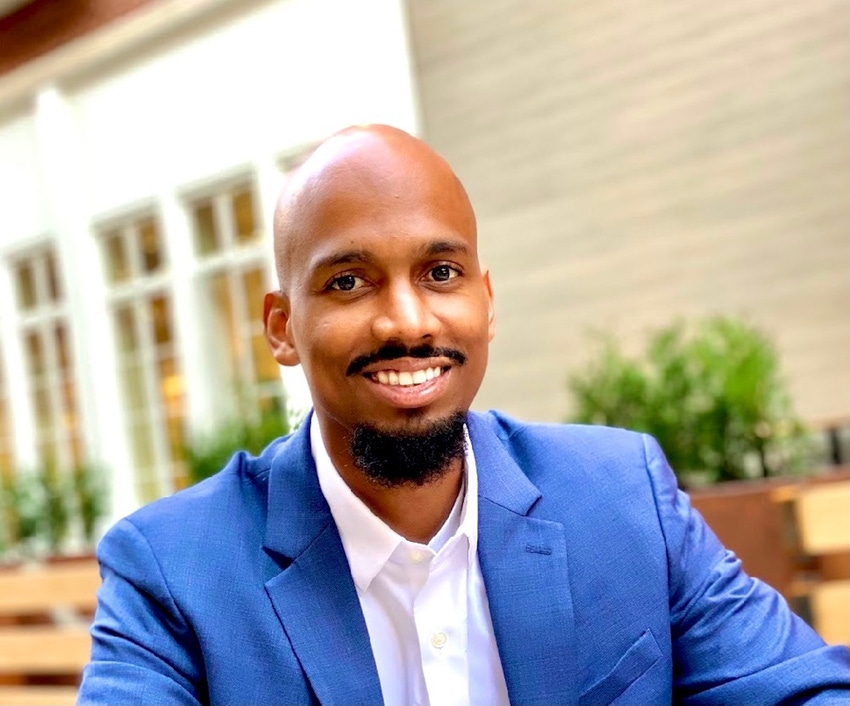 AJ Yawn, founder and CEO of ByteChek, is a young Black man with a shaved head and a Van Dyke beard, wearing a blue blazer.