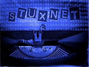 Stuxnet on paper inside a typewriter with binary code behind 