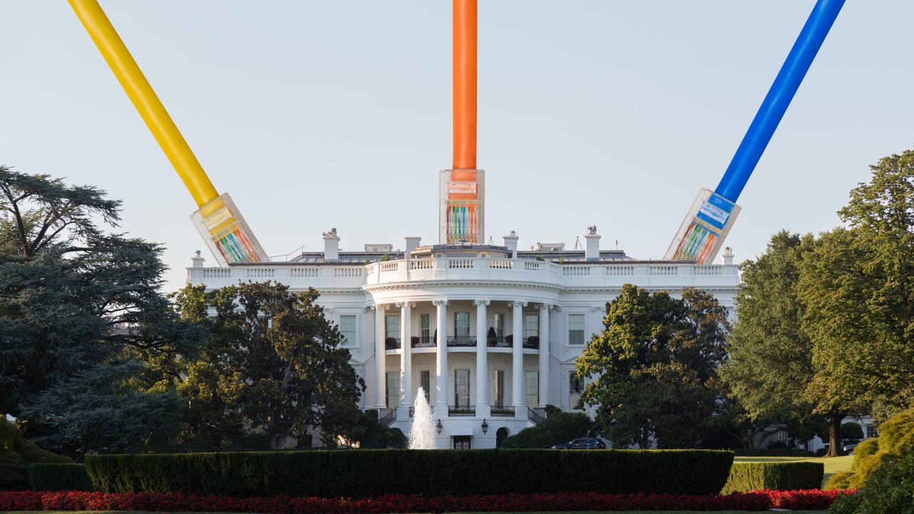 White House with cables attached to the roof to symbolize hack of government data White House with cables attached to the roof to symbolize hack of government data