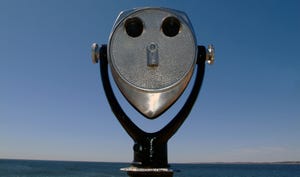 Coin operated binoculars; blue sky behind it