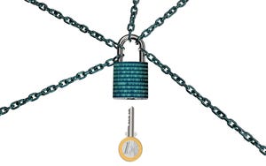 A lock covered in code stamped with chains with a key ready to be inserted