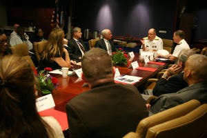 Rear Adm. Richard C. Vinci meets with the executive staff of Veterans Administration North Texas Healthcare System