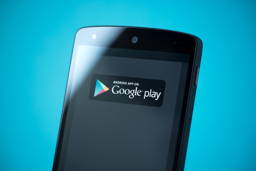 Black mobile device with the logo for the Google Play store displayed on the screen Black mobile device with the logo for the Google Play store displayed on the screen