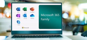 Microsoft 365 icons on a laptop that's sitting on a table