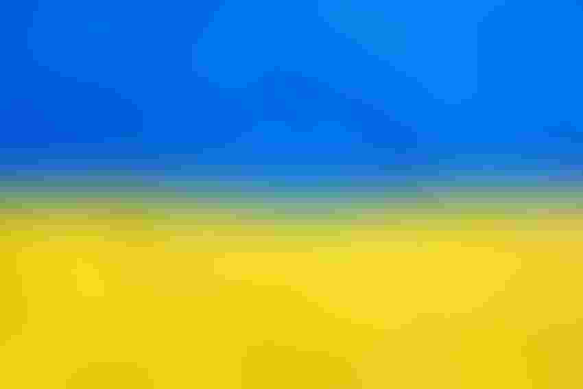 Image of Ukraine flag with code superimposed to illustrate network cybersecurity in the country