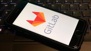GitLab logo on a mobile phone GitLab logo on a mobile phone