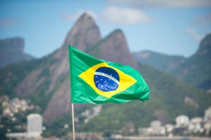 Flag of Brazil waving on a pole