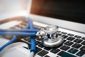 Stethoscope on a laptop