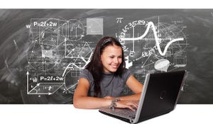 A woman looks at a laptop computer screen with a blackboard image of formulas and equations behind her.