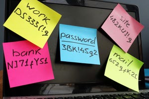 password manager concept. Laptop with memo stickies on the screen.
