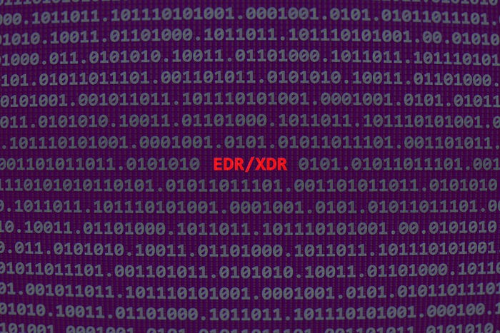 The letters EDR/XDR amid binary code