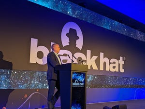 Ollie Whitehouse on stage at Black Hat Europe