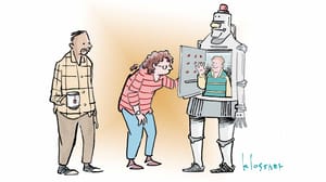 Two people standing in front of a robot and looking at a person inside the robot's torso. Two people standing in front of a robot and looking at a person inside the robot's torso.