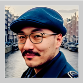 David Randleman, field CISO at Coalfire, wears a blue cap, wireframe glasses, and a mustache as he poses in front of a canal