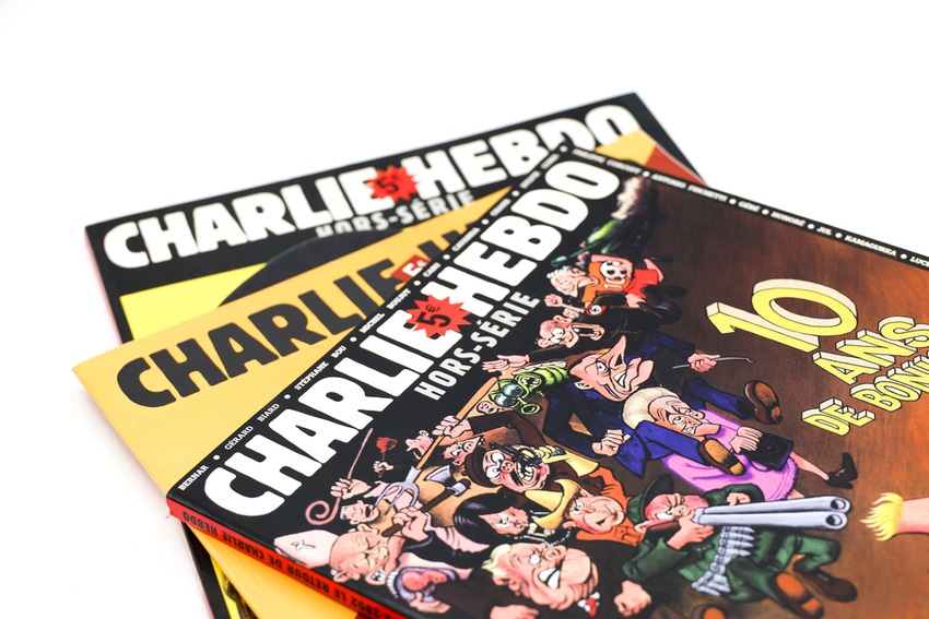 Charlie Hebdo Newspaper Collection on a White Background