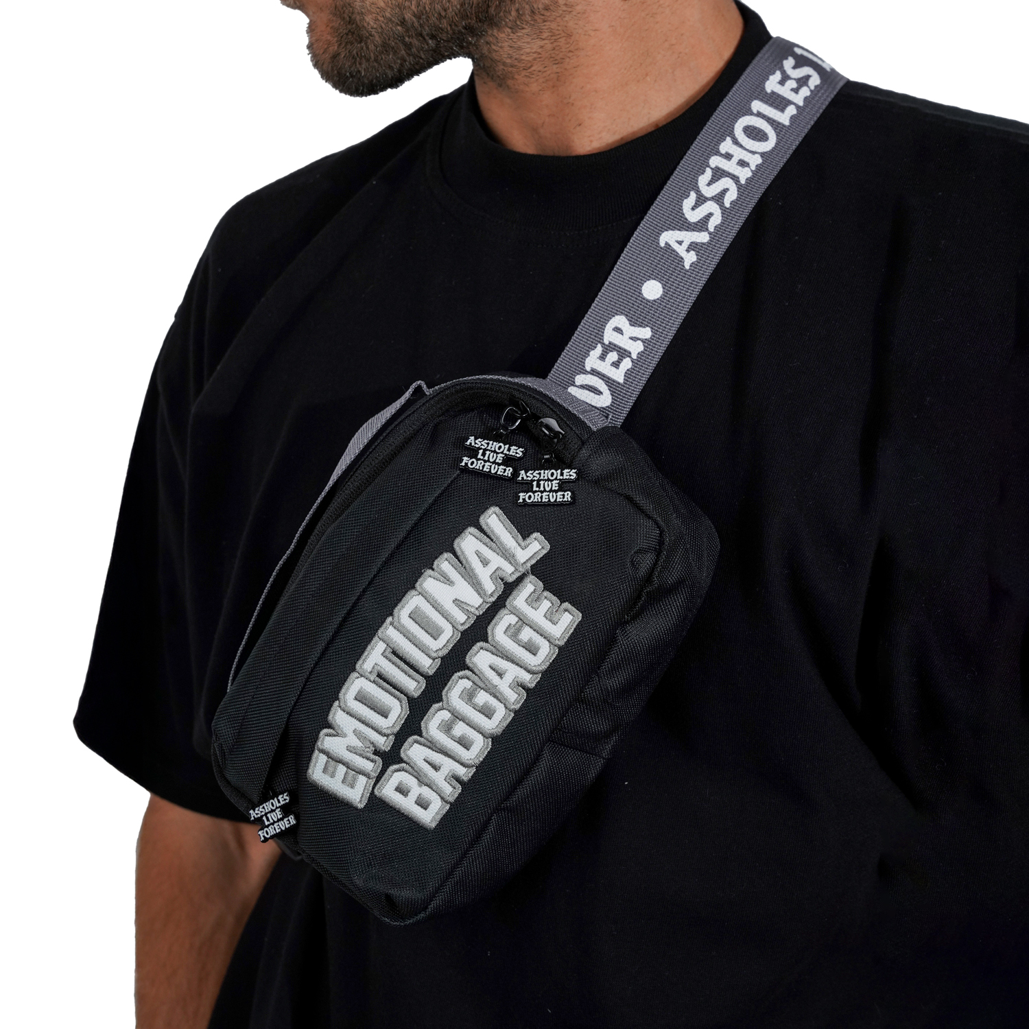 Doc Johnson Assholes Live Forever Emotional Bagage Bæltetaske    - Sort