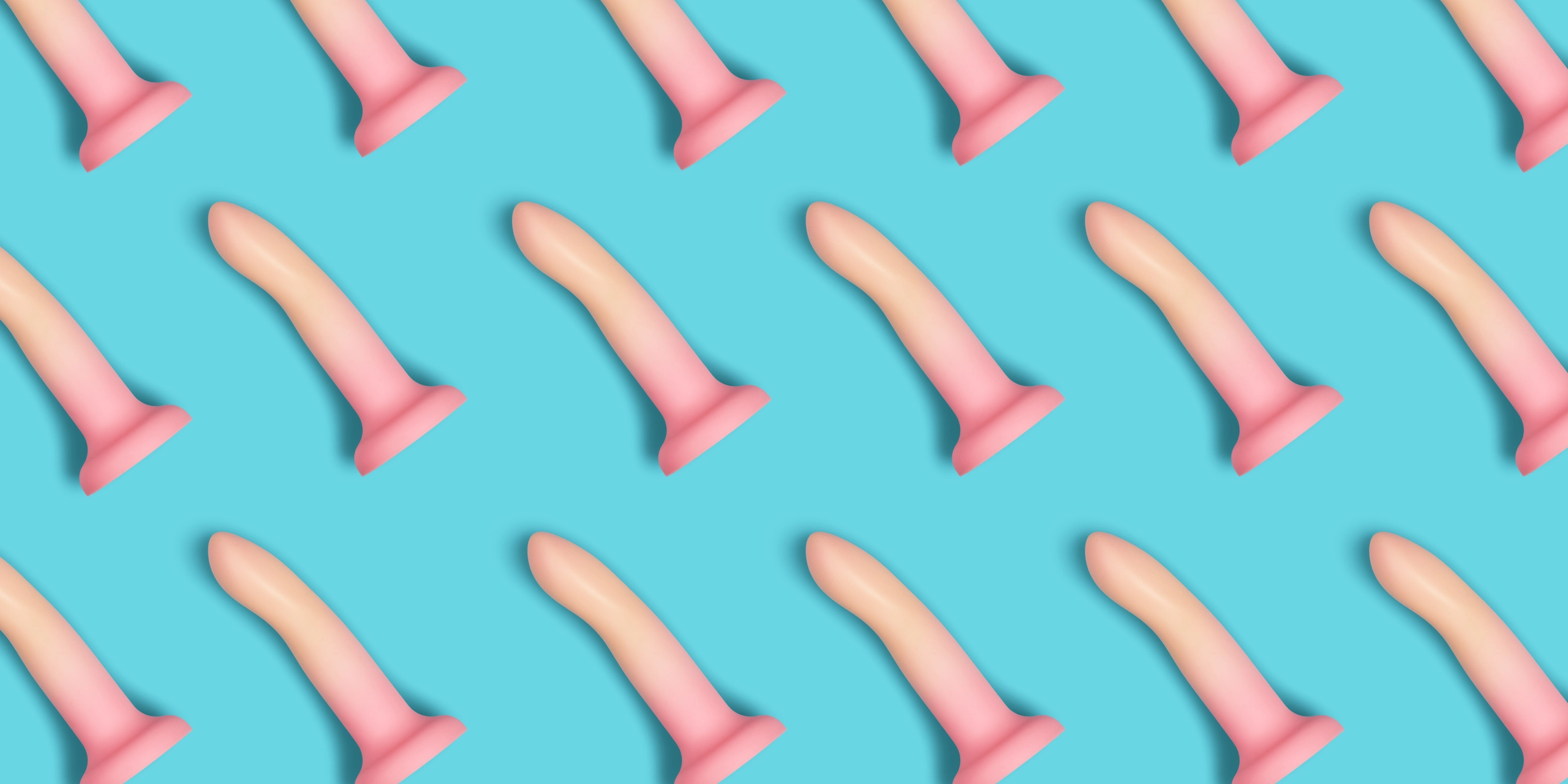 Roze dildo's naast elkaar in een blauwe achtergrond