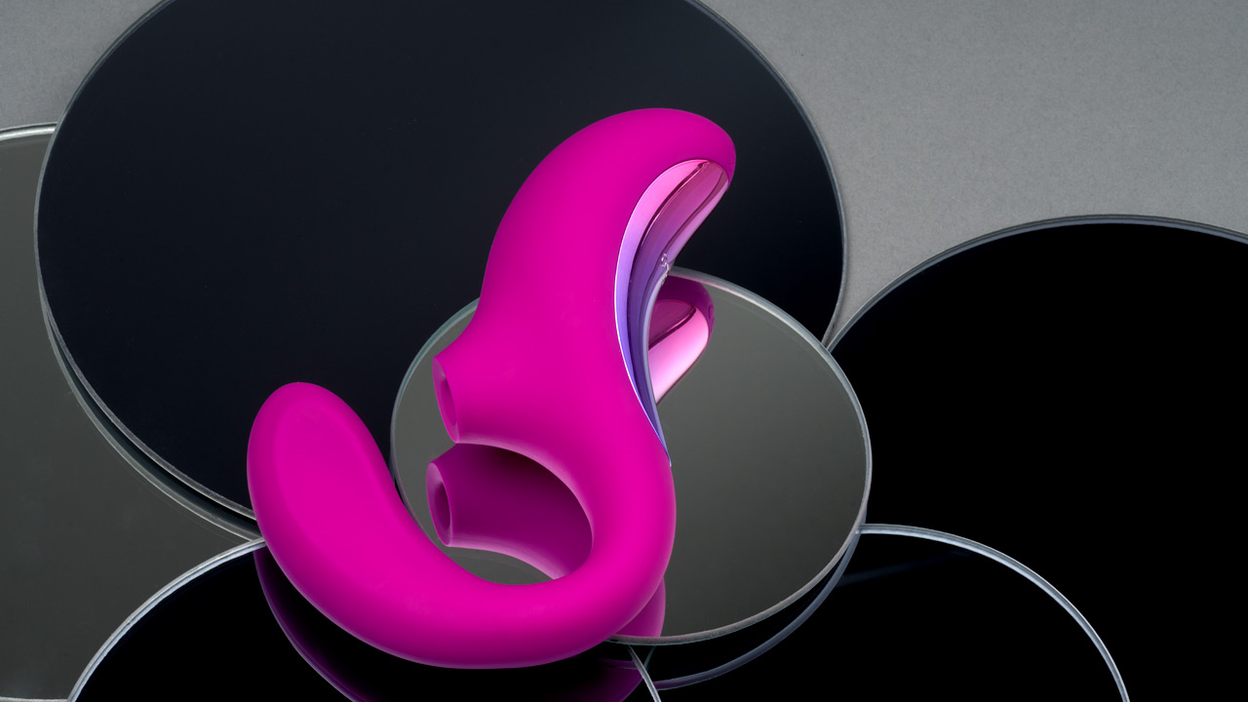 Pink Lelo sex toy for women on top of a mirror