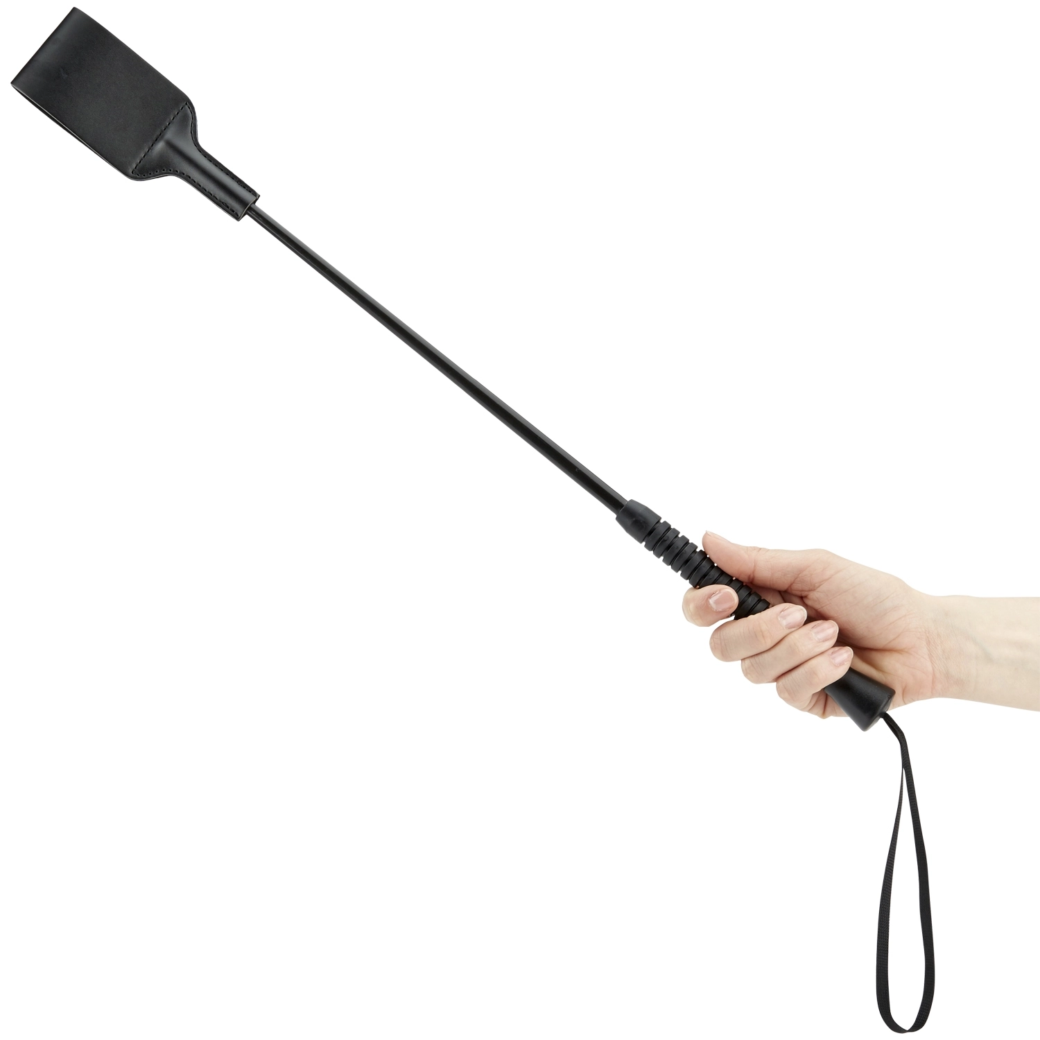 A hand holding a riding crop