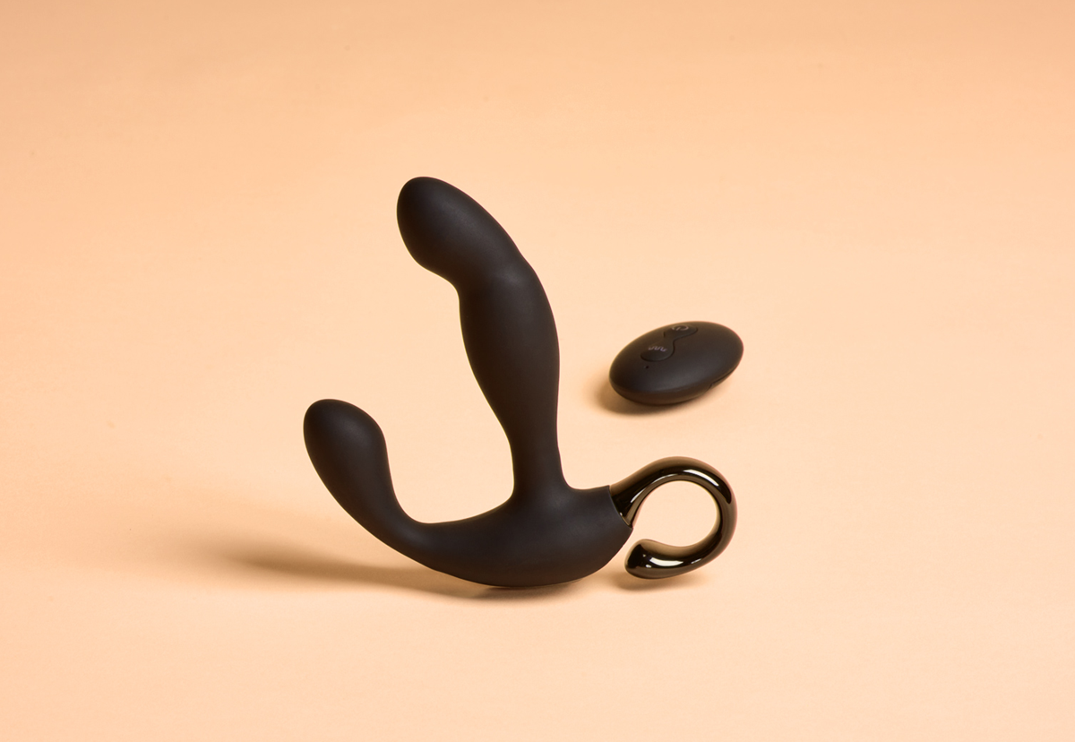 prostata stimulator med en orange baggrund