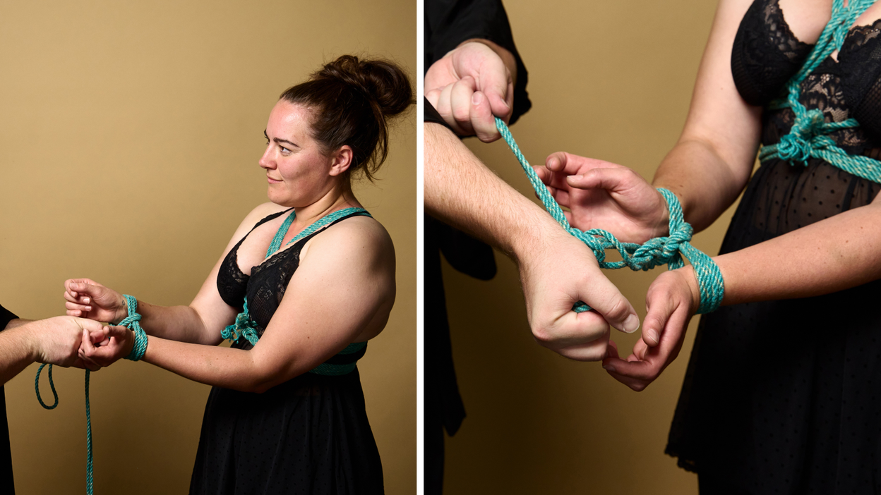Close up of a person having bondage ropes tied around the hands