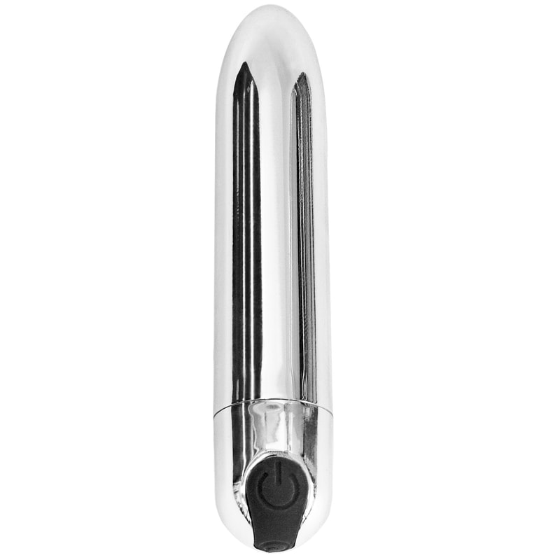 Blank sølvfarvet bulletvibrator med spids top og sort knap i bunden, stående på hvid bund