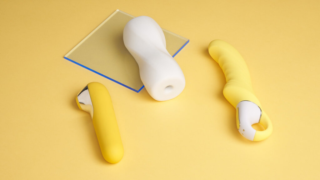 Witte en gele seksspeeltjes voor vrouwen en mannen
