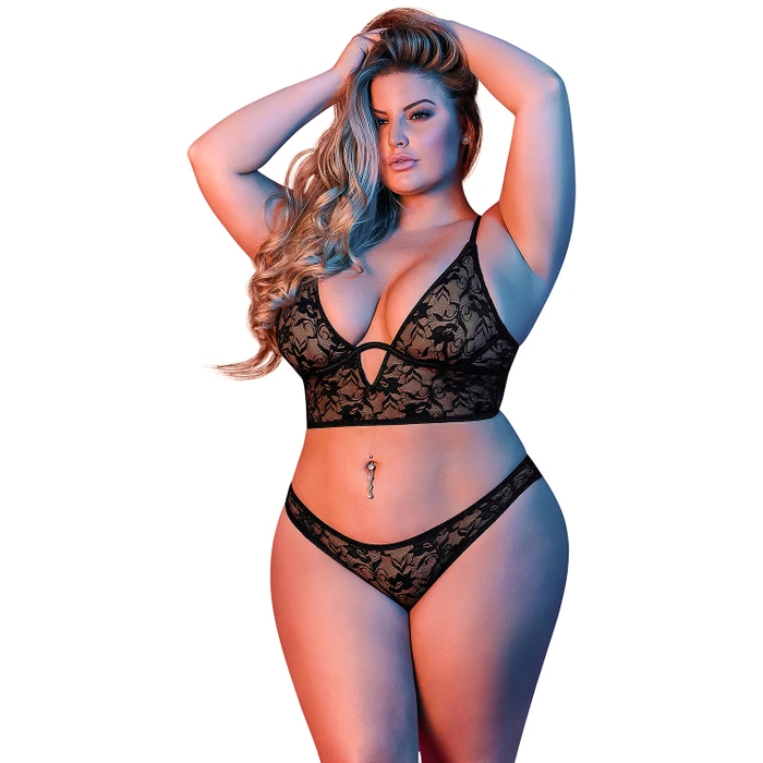 Plus size woman in a black, lace lingerie set