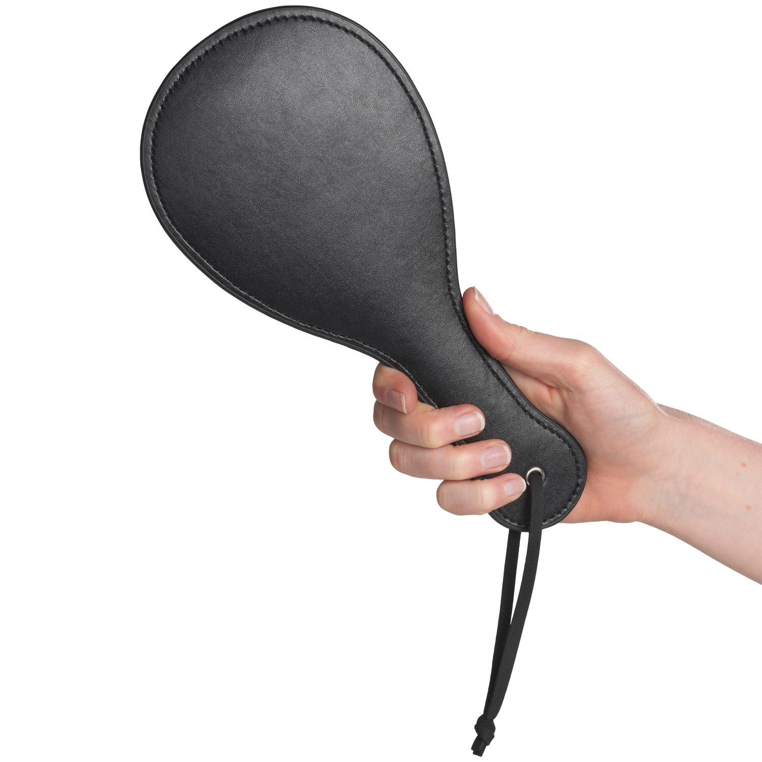 A hand holding a sound spanking paddle