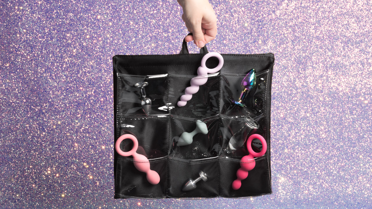 Hanging storage unit with anal sex toys