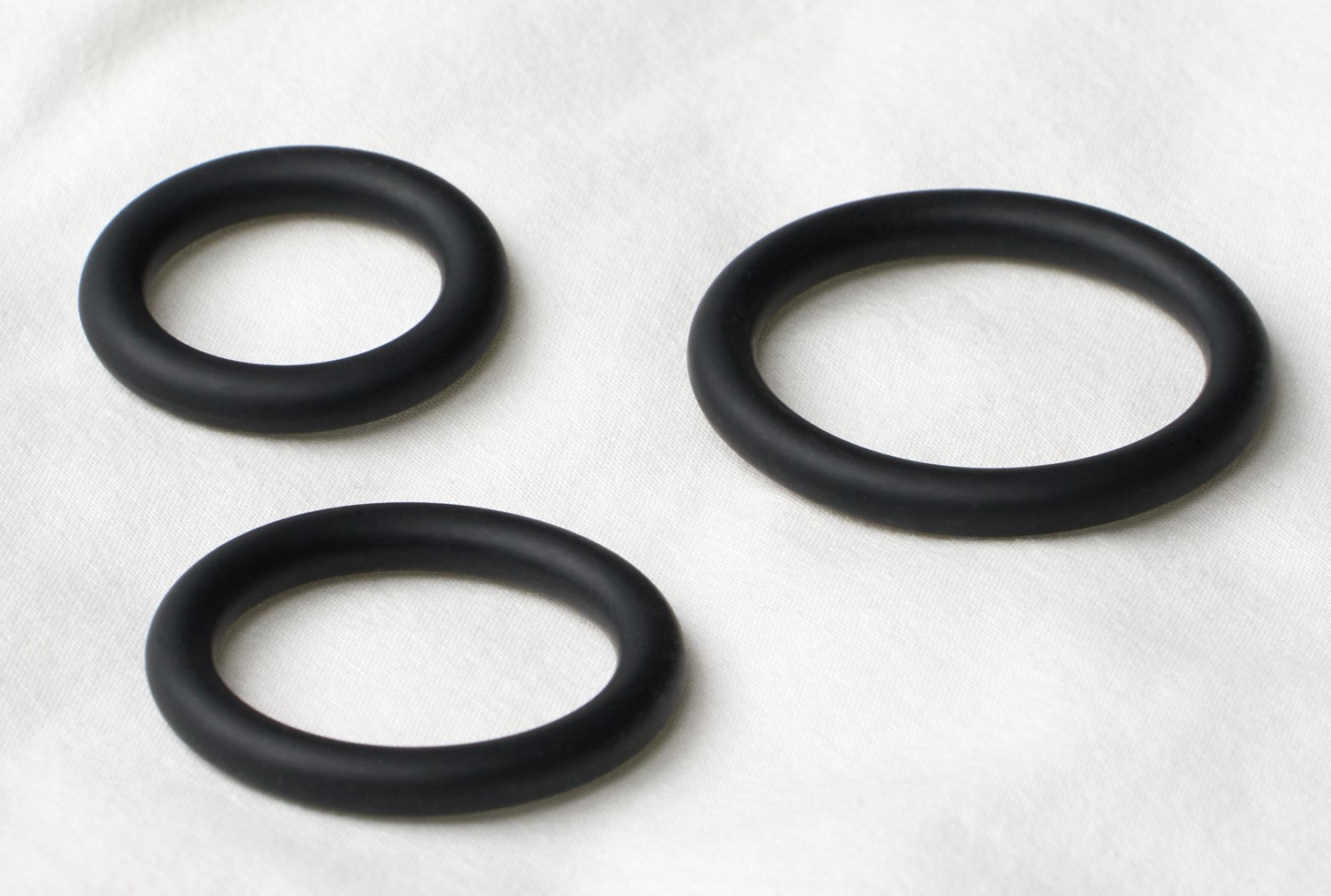 Three penis rings in different sizes. 