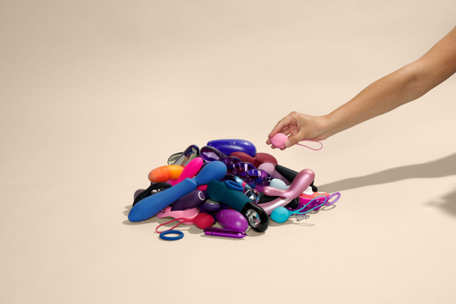 Pile of many different sextoys on a neutral background