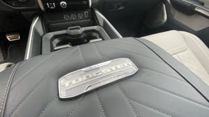 Stitching and Tungsten badge on Ram 1500 console.