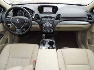rsquo13 Acura RDX dark brown carpeting complements beige interior