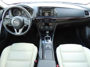 Whitealmond seats burgundyhued instrumentpanel trim add luxury touch to rsquo14 Mazda6