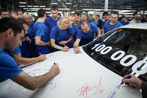 Workers celebrated 100000th BMW assembled in August