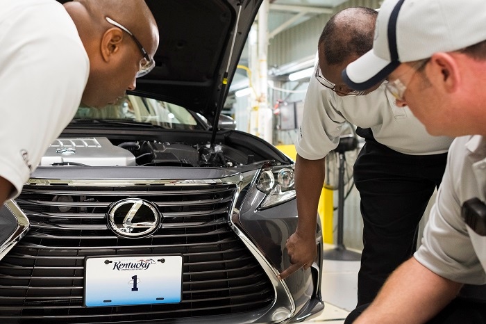 Lexus Georgetown empolyees check tolerances between ES39s spindle grille sheetmetal Lexus Georgetown empolyees check tolerances between ES39s spindle grille sheetmetal