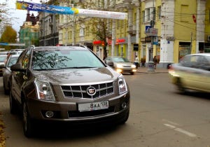 Automaker will continue importing Cadillacs into Russia