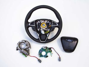 Ford adaptive steering technology housed inside steering wheel