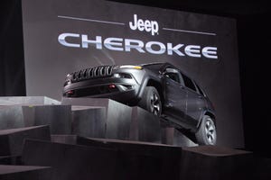 rsquo14 Jeep Cherokee makes dramatic auto show entrance