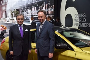 BMWrsquos Ludwig Willish Ian Robertson celebrate NAIAS arrival of refreshed 6Series
