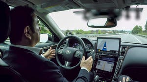 Ghosn driving hands-free 2017