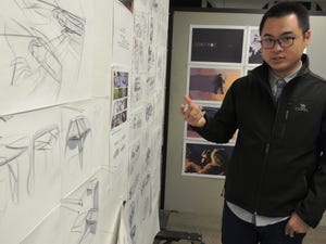 Enze Enzo Zheng explains his initial concept ideas during the initial design review