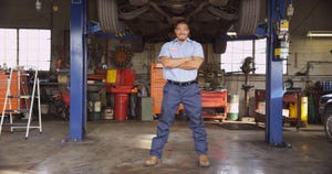 standing auto mechanic