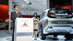 Mitsubishi CEO Masuko introduces GC concept plugin hybrid at 2013 Tokyo auto show
