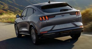 2023-Ford-Mustang-Mach-E-Driving-On-A-Road