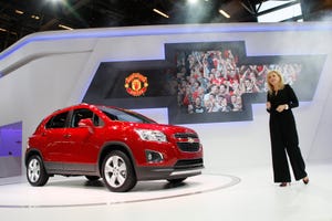 Docherty with pivotal Chevy Trax small SUV at Paris debut