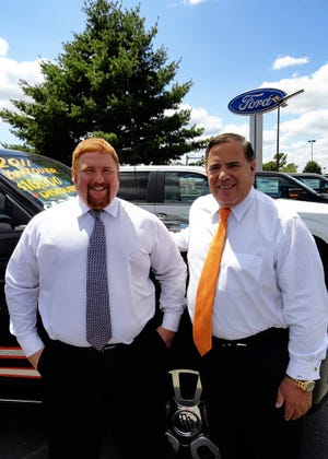 Gary Drewing right and son Rusty run Joe Machems Automotive Group
