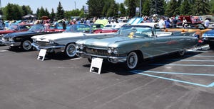 1960 Cadillac Eldorado Biarritz. Left is 1960 Chrysler Imperial Crown  - Copy